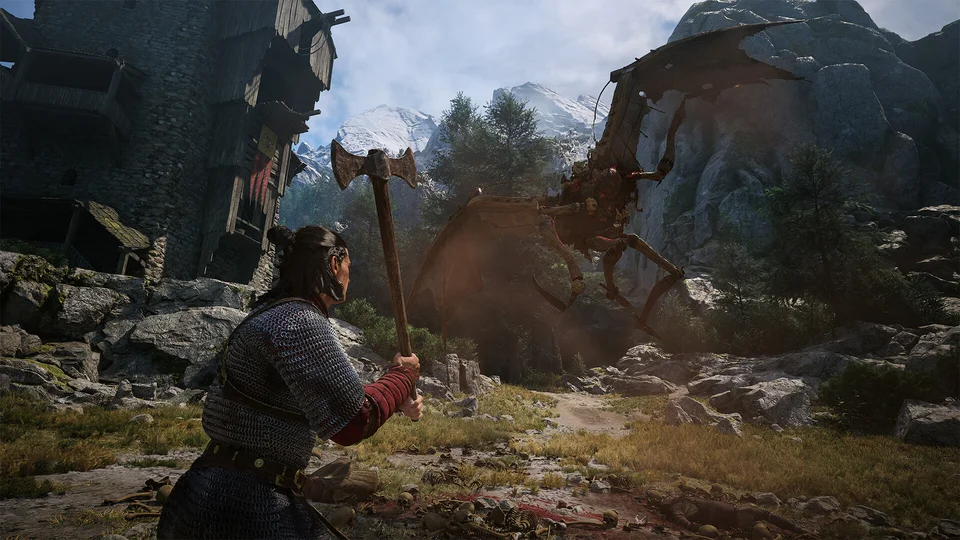 Coen facing a creature in a rocky village, from the official Steam store screenshots